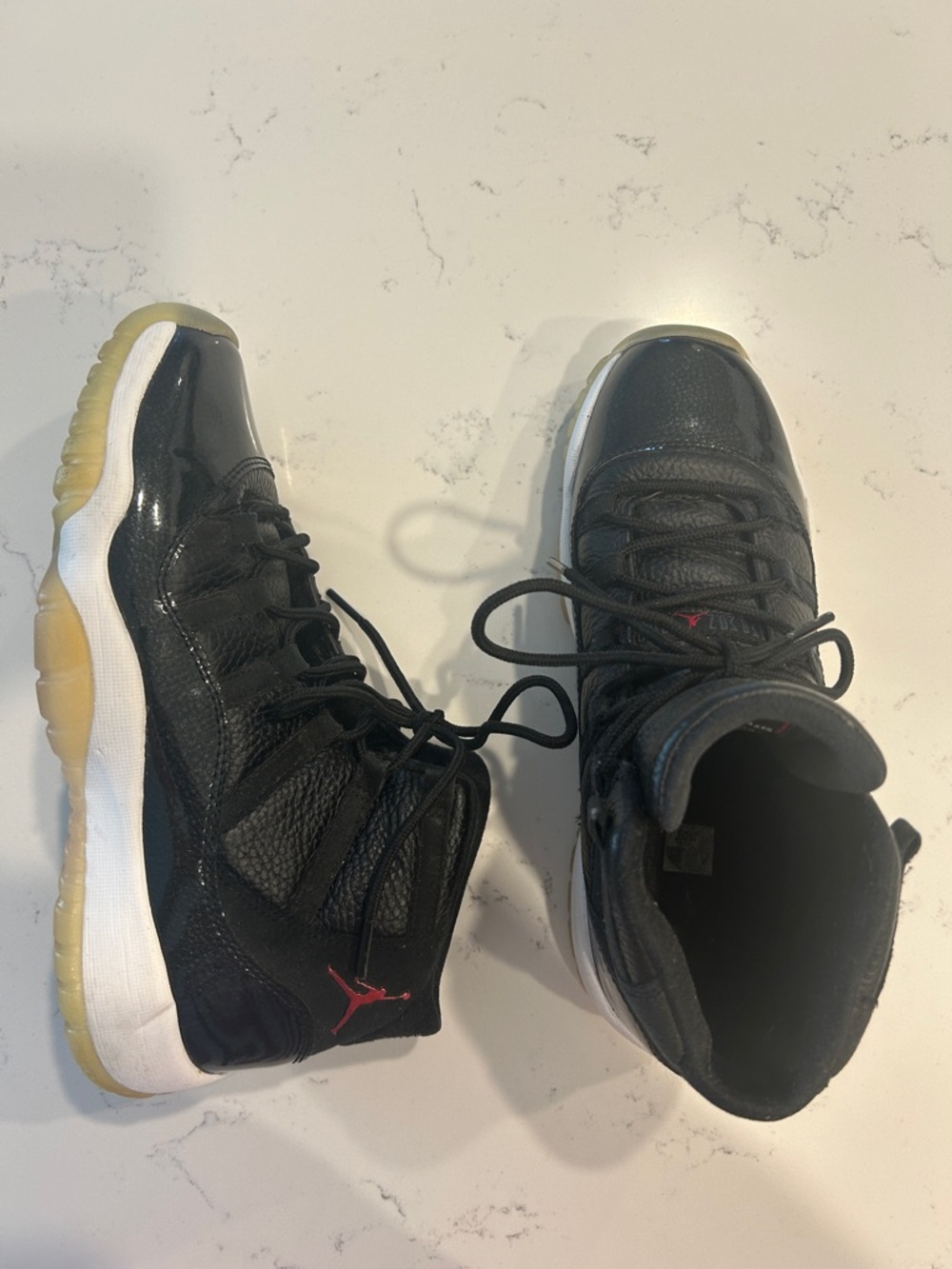 Jordan 11’s Kids Black Shoes with Red Jumpman